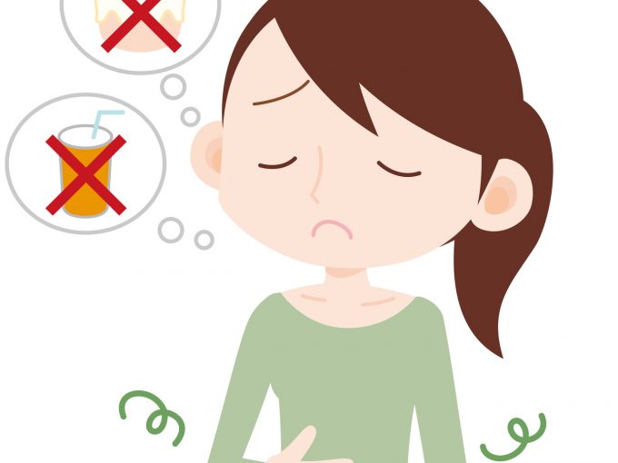 食事を我慢する女性